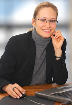 Woman sitting at a table