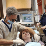 Dr. Poksay treating a patient