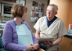 Dr. Rasmussen talking to a patient