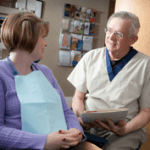 Dr. Rasmussen talking to a patient