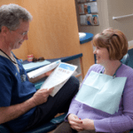 Dr. Poksay talking to a patient